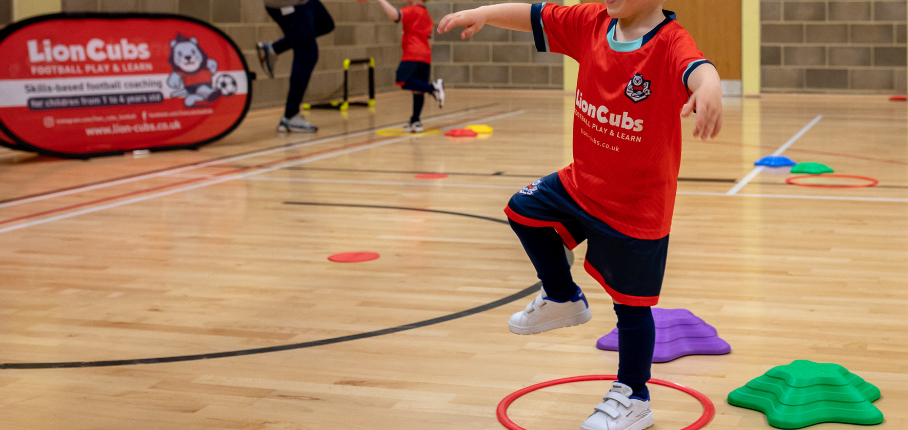 lion cubs football coaching child balancing